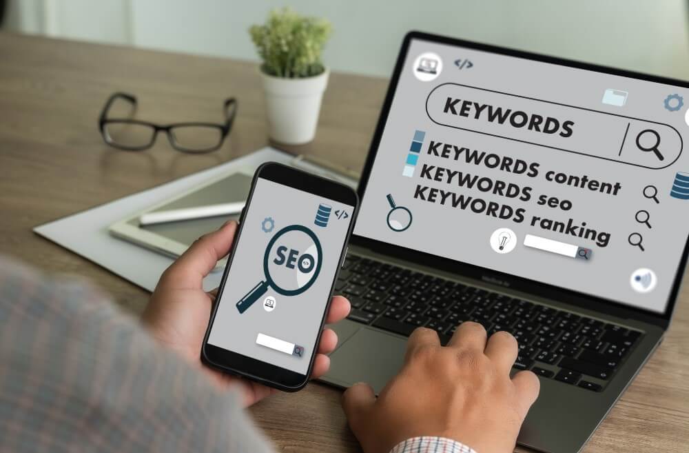 A digital marketer analyzing mobile SEO metrics on a smartphone and laptop, emphasizing the importance of mobile optimization for search rankings.